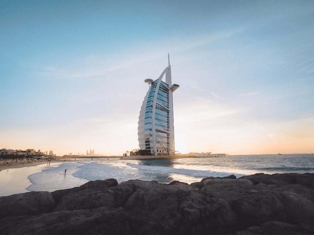 Burj Al Arab and Dubai coastline at golden hour